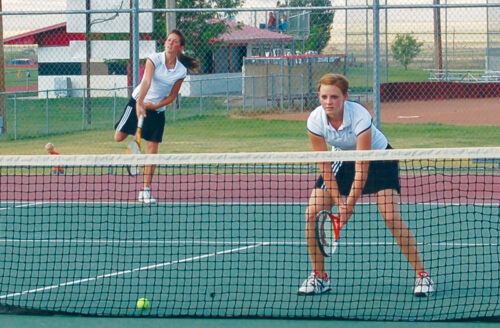 Audrey Naylor (serving) And Nikki Barton. Second Doubles Team For Mhs.